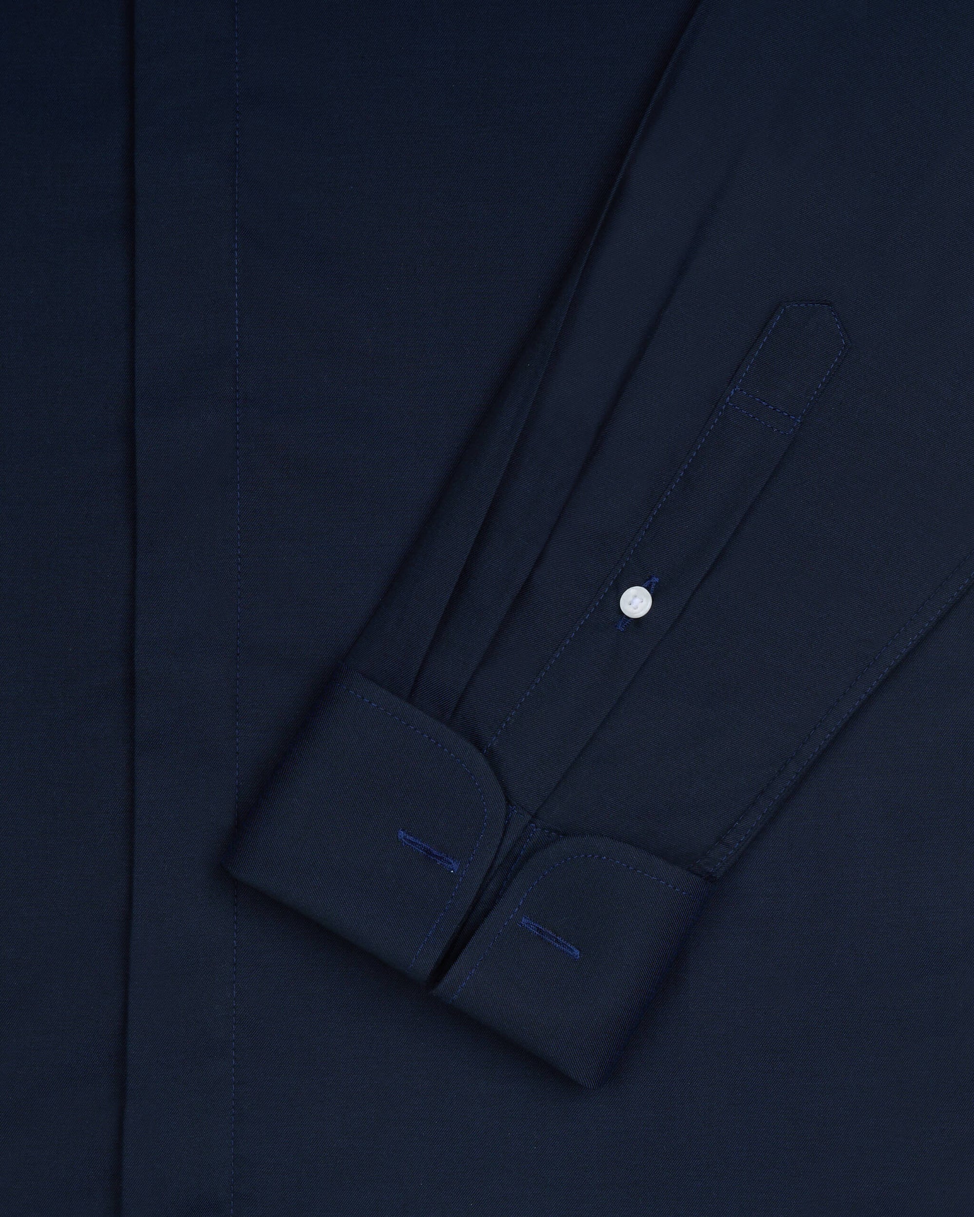 custom details on a cuff of a shirt